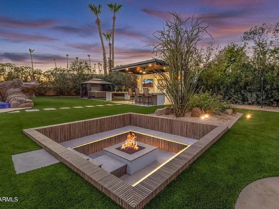 Sunken fire pit and cabana bar by Turfli